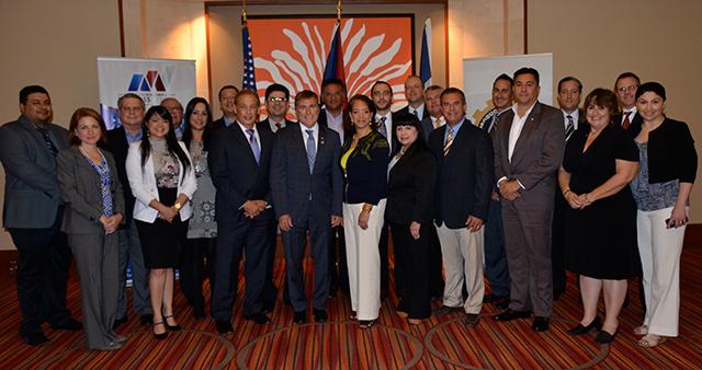 Conference attendees with National Director Castillo and James W. Brewster, Jr., U.S. Ambassador to the Dominican Republic